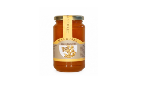 Pot de 500 ml de mel de mil flors.